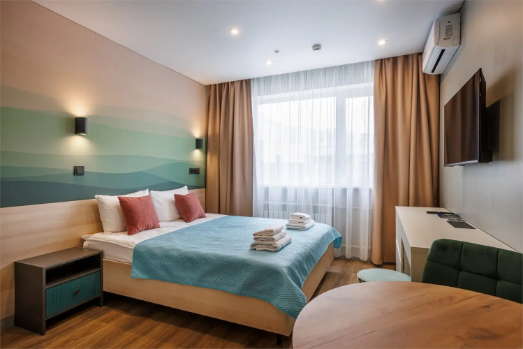 Фотография номера апарт отеля Хеппи Хоум