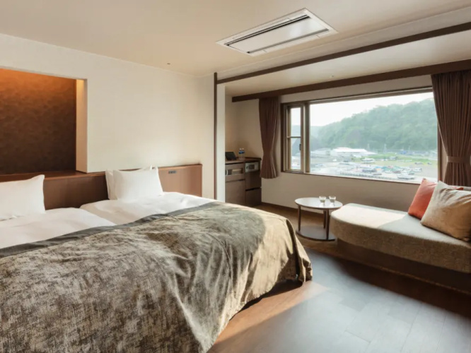 Twin room with partial sea view