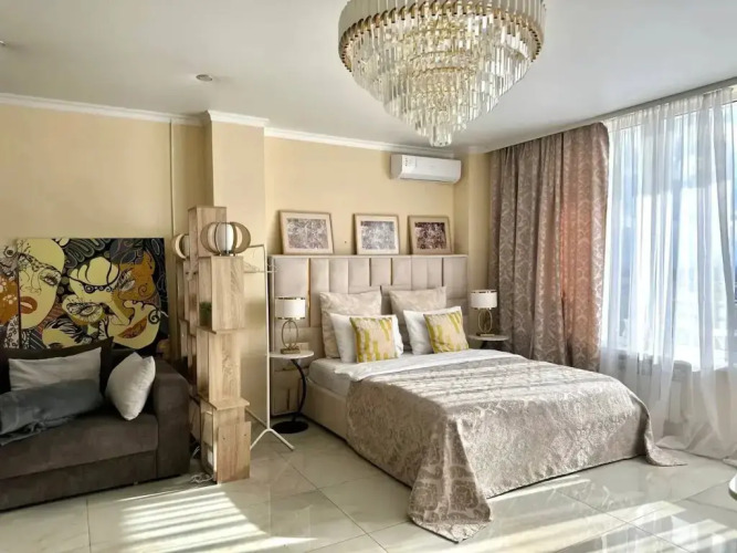 Фотография номера квартиры Апартаменты Атмосфера комфорта студия Капучино с дизайнерским ремонтом