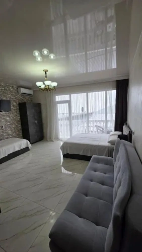 Standard Quadruple room with balcony and with sea view