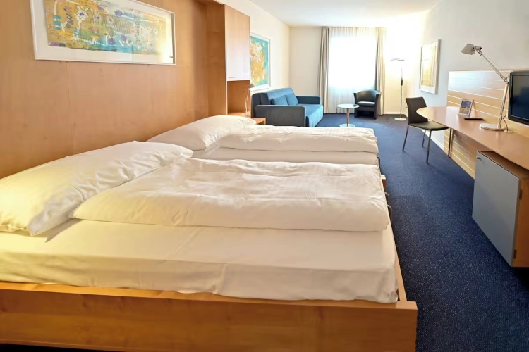 Comfort with Sofa Twin room