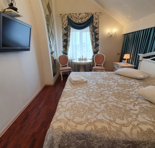 Фотография номера гостиницы Колесо