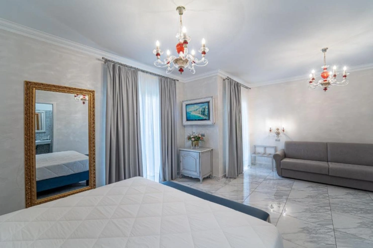 Deluxe Quadruple room with balcony