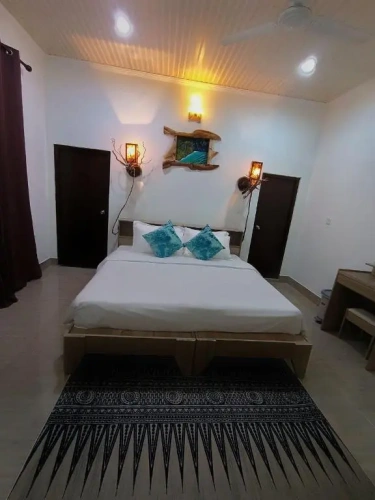 Quadruple room with garden view