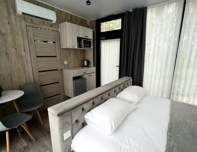 Фотография номера гостиницы Экопарк Поляны