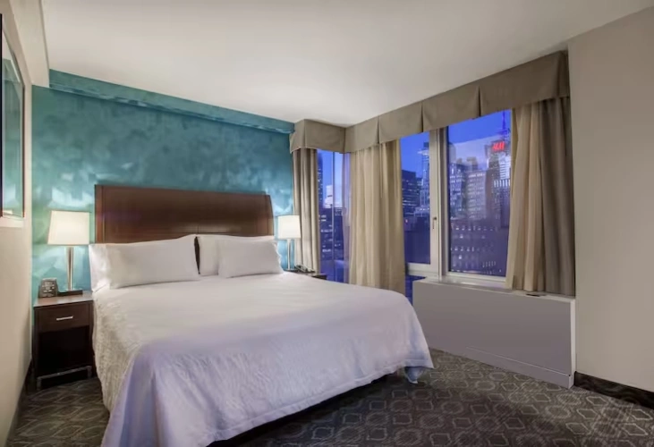 Room with city and Seasonal Parade views