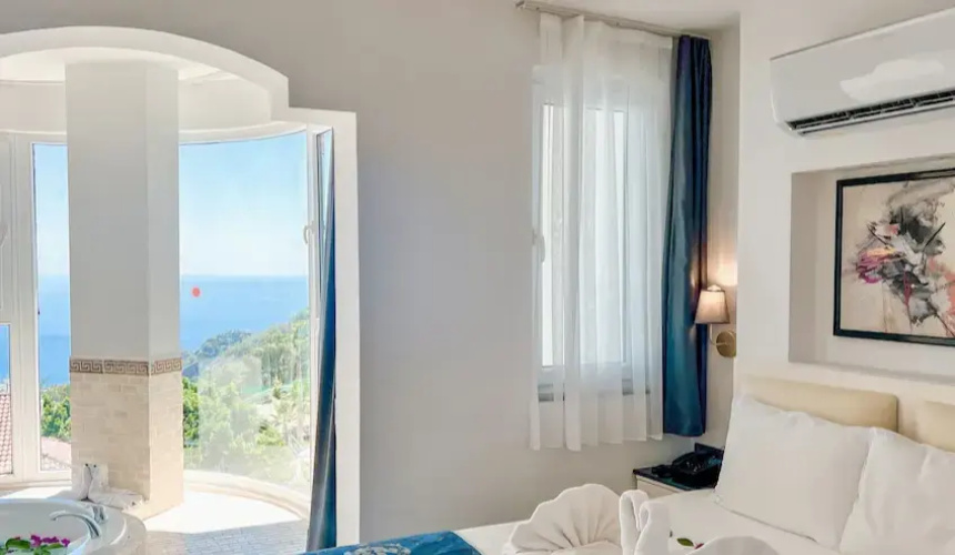 Tropical Jacuzzi room with sea view