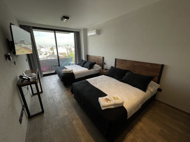 Deluxe Quadruple room with balcony