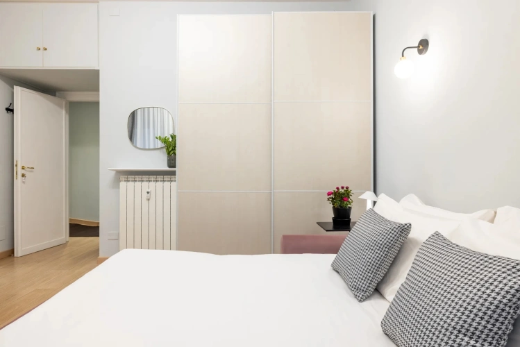 Room with sofa bed and comfortable regular mattress