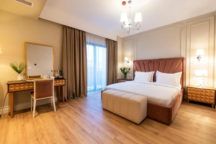 Deluxe Family Triple room with partial sea view