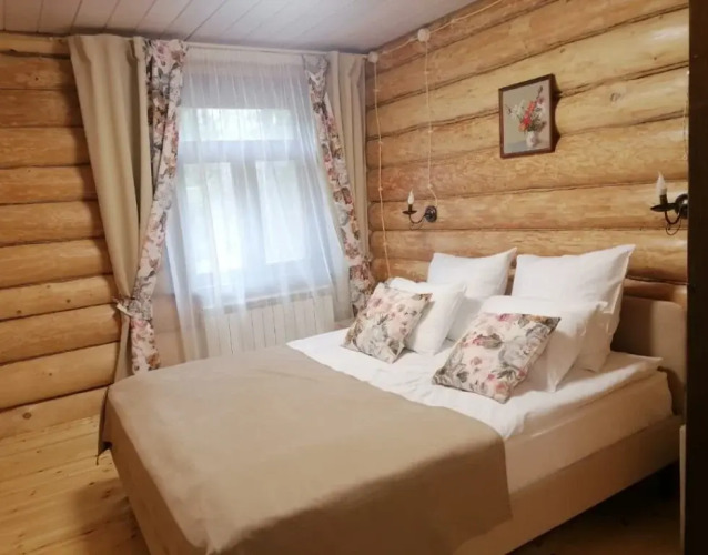 Фотография номера гостиницы Удивительная Деревня Мандроги