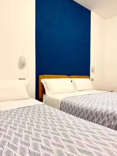 Triple room with partial sea view