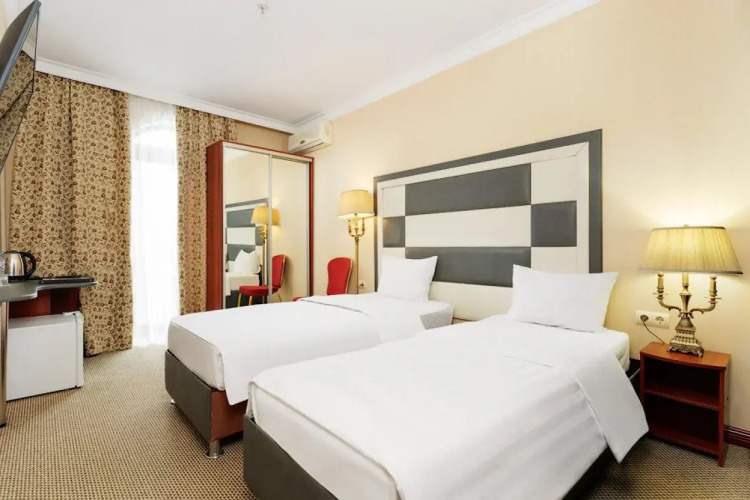 Двухместный номер Стандарт 2 отдельные кровати