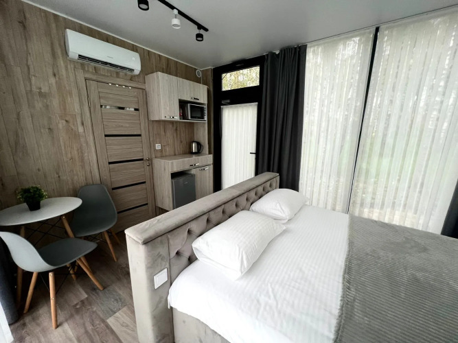 Фотография номера гостиницы Экопарк Поляны