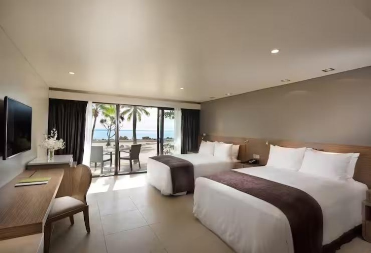 Twin Guest Room with balcony and beachfront
