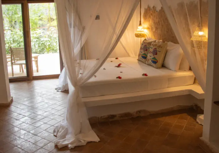 Deluxe Mnara Triple room with garden view