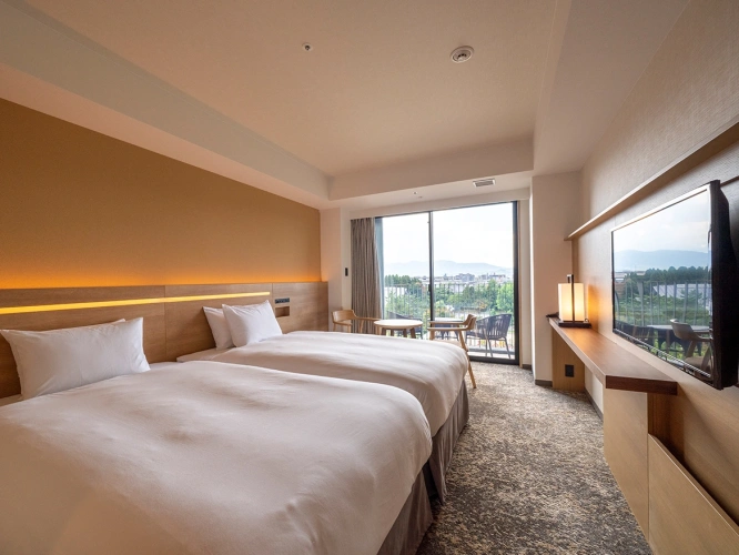 Corner Twin room with balcony and with park view