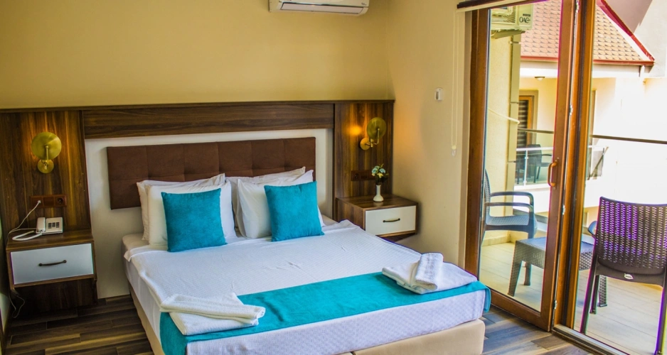 Quadruple Family Suite with balcony and with pool view