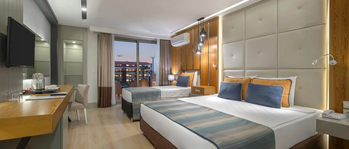 Deluxe Triple room with garden view
