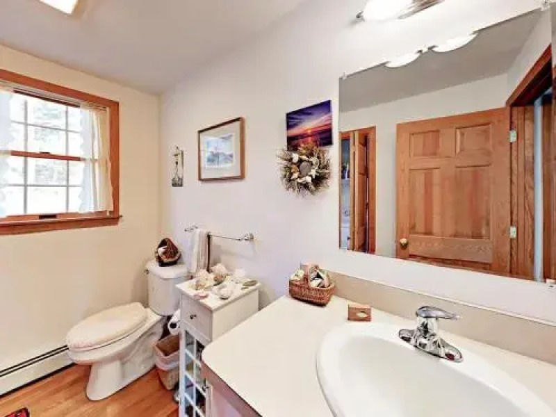 Woodsy Cape Cod Home by RedAwning