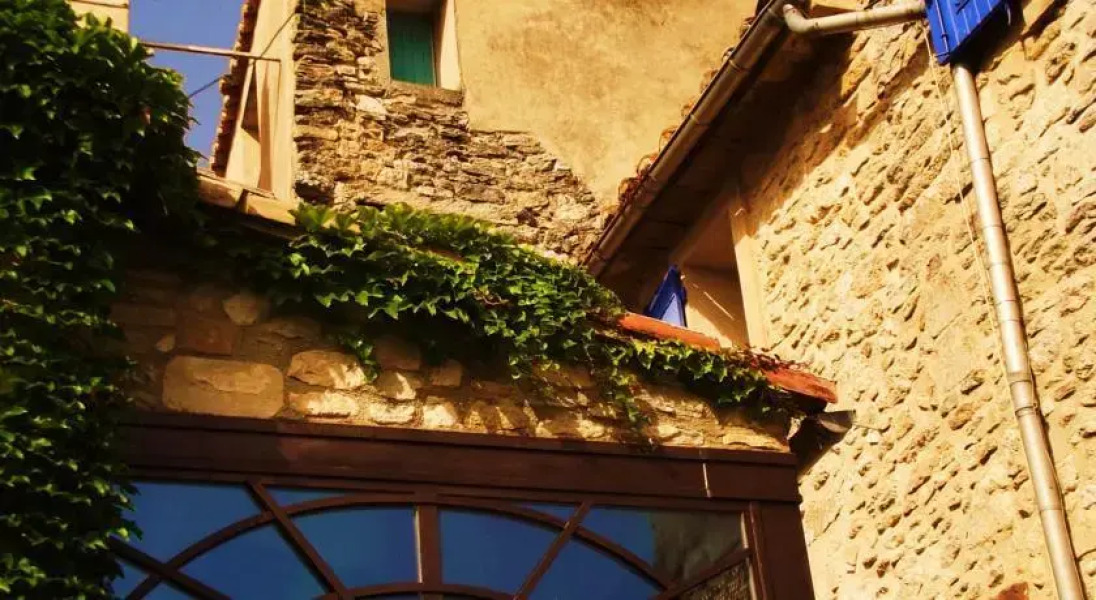 La Maison aux Volets Bleus