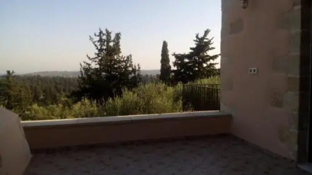 Tzitzifes Stone Mansion