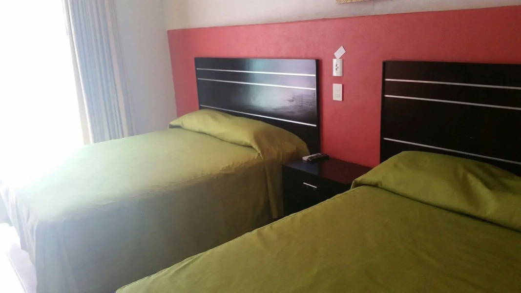 Hotel y Suites Los Encantos