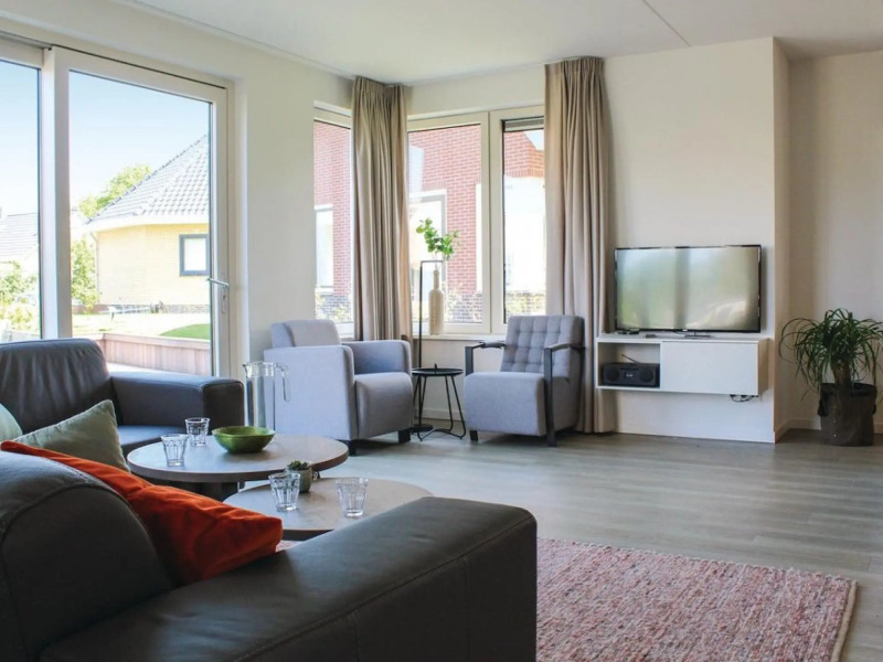 Beautiful villa with sauna, in a holiday park on the water in Friesland