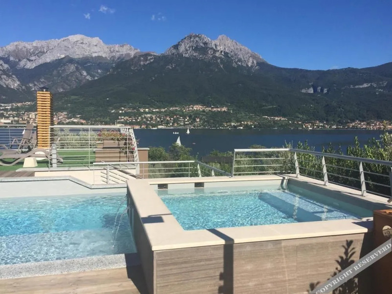 Bellagio Village- 4 Apartments by the lake - Seasonal Warm Pool and Sauna