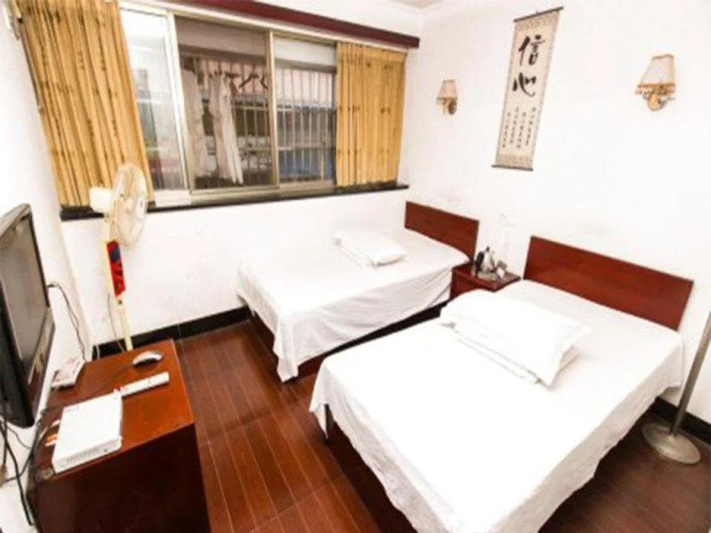 Xuancheng Jingxian Hehuatang Business Inn