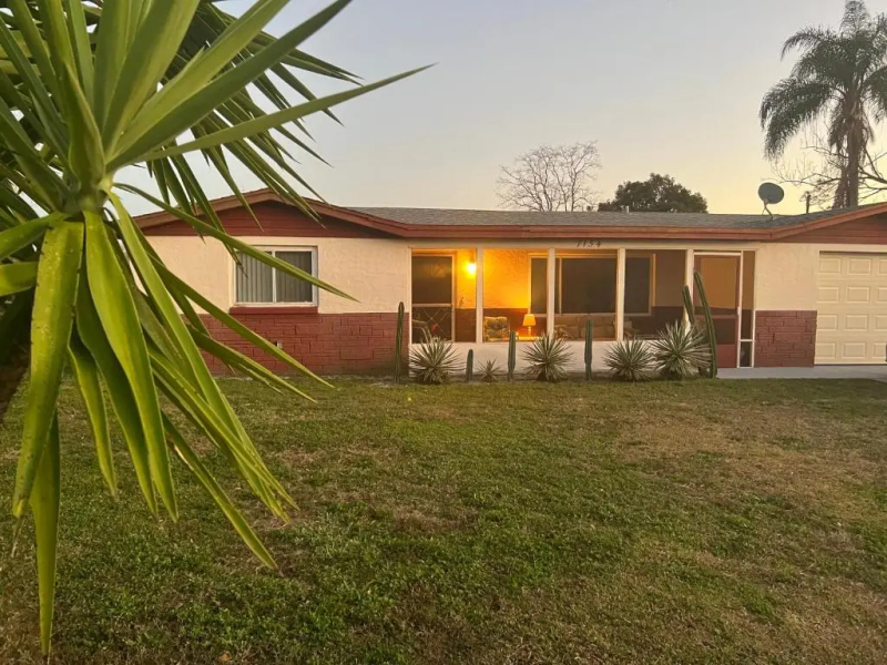 Private Tropical Waterfront Sanctuary with pool, hot tub & an island!