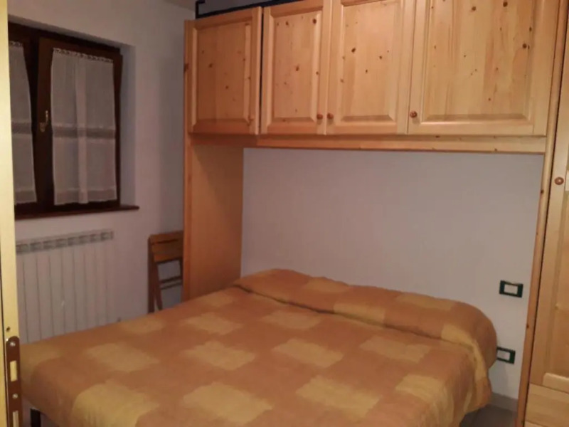 bilocale con giardino e box