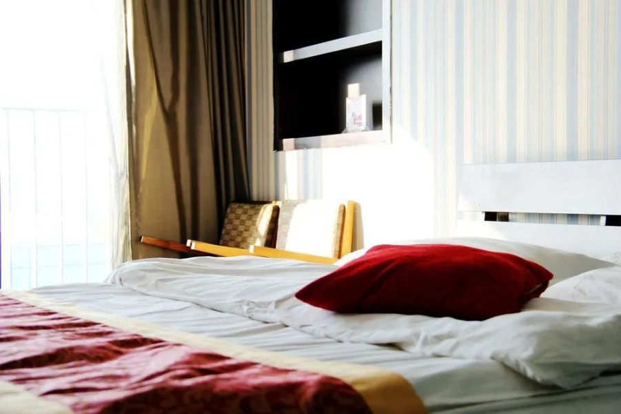 Enji Apartment Hotel Bainianhui - Dalian