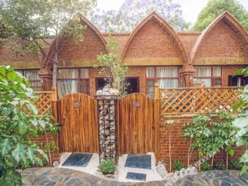 Pujin Garden Hot Spring Hotel (Mile Huquan)