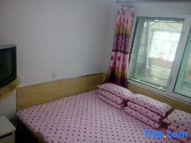 Xuexiang Jinlong Family Hotel