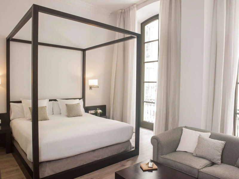 Отель Molina Lario