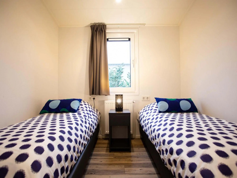 Modern chalet with outdoor sauna and spa, on a holiday park, Hoorn at 8 km.