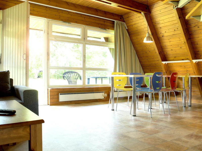 Detached holiday home, decorated with wood, on the Ostsee