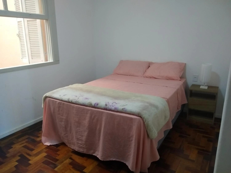 Quarto aconchegante em Apê, no Calçadão