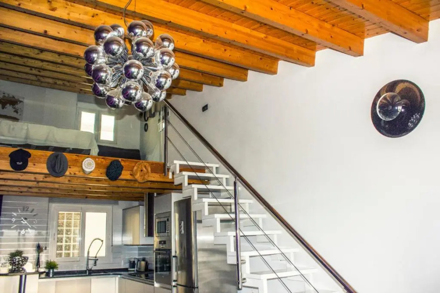 Ático con estilo y acogedor.