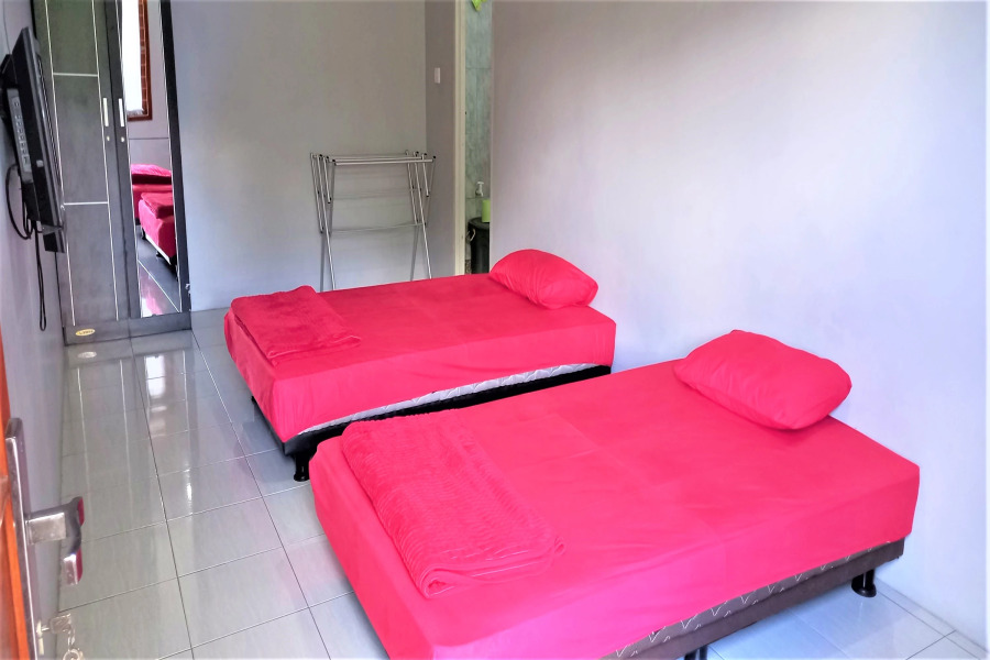 Nabila Syar i Guesthouse by ZUZU