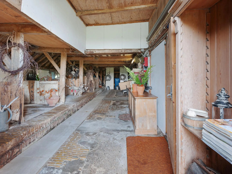 Farmhouse by Lauwers River With Rowing Boat