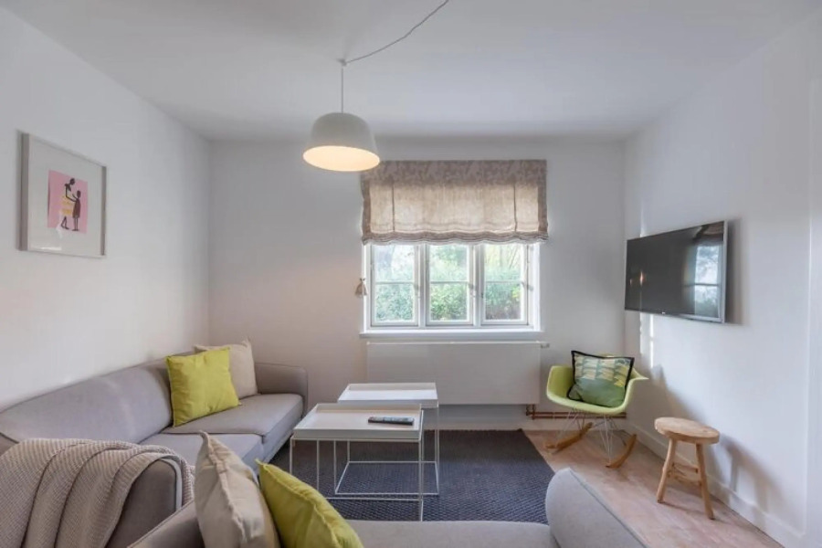 thatched cottage with tiled stove