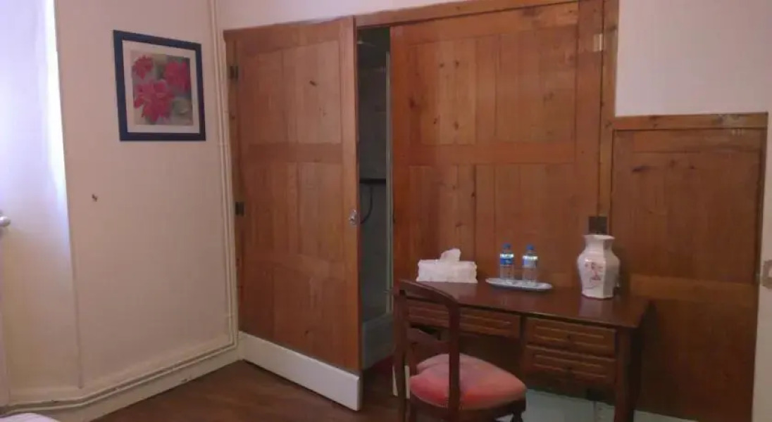 La Demeure du Gardien du Temps qui Passe