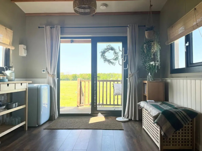 1br-sleeps2-field View-parking-cabin Experience
