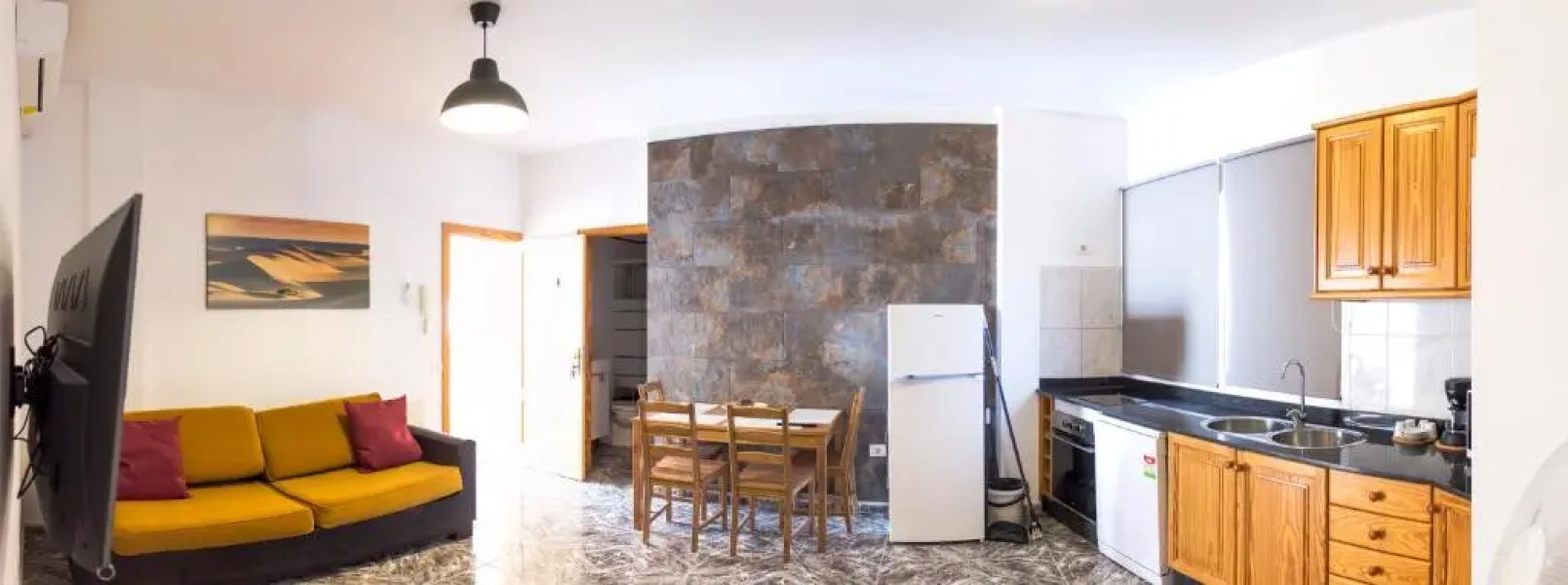 Apartamentos La Aldea Suites