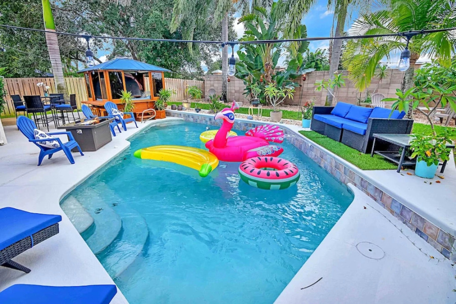 Urban Oasis W/hot Tub, Heated Pool And Private Movie Theater 2 Bedroom Home by RedAwning