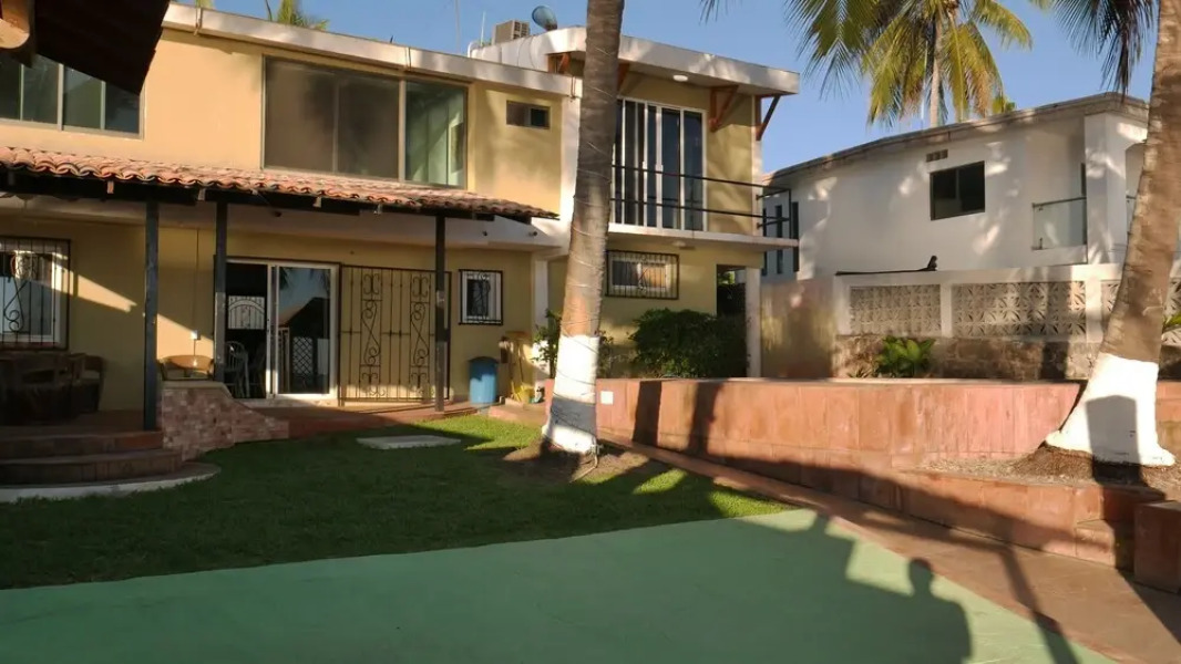 Casa Mister Ken pie de playa Los Cocos