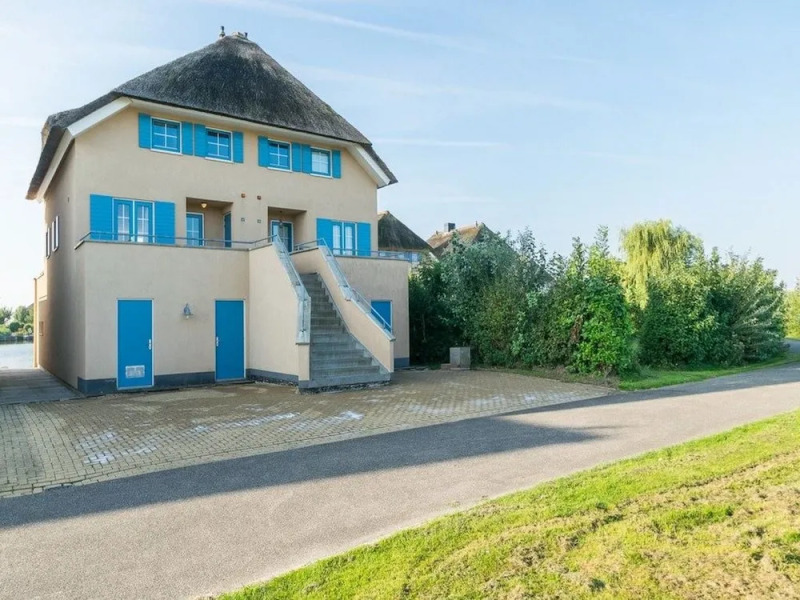 Exclusive Holiday Home Floating on a Lake in Friesland