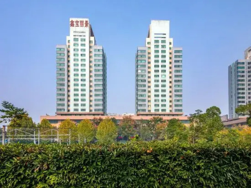 Xinbao Lijing Hotel (Shayang Hehua Road Food Street)